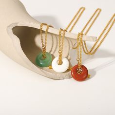 Featuring vibrant gemstones and an 18k gold-plated toggle, the Gemstone Toggle Necklace is a fusion of color and contemporary design. It's perfect for adding a bold yet elegant touch to any ensemble. Modern Yellow Gold Jade Jewelry, Modern Necklaces With Toggle Clasp For Gift, Modern Necklace With Toggle Clasp For Gift, Modern Gold Jade Jewelry, Modern Jade Gemstone Jewelry, Modern Round Natural Stone Necklaces, Modern Round Gemstone Beads Jewelry, Elegant Gold Toggle Necklace With Natural Stones, Handmade Modern Jade Jewelry