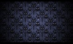 an image of a dark blue wallpaper with black and white skulls in the middle