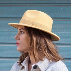 Crafted from stiffened wool felt, this yellow fedora will add sunshine to any outfit. Featuring the fedoras classic deeply indented crown, pinched at the front with tonal petersham trim.  An elegant addition to any style of winter coat and a pop of colour with your double denim!   Please send us your head measurement with your order (Place a tape measure on your forehead and pass around the head, ensuring that the widest part of the head is included, or where you would like your hat to sit. (A f Straw Boater Hat, Straw Boater, Boater Hat, Double Denim, Felt Hat, Wool Hat, Tape Measure, Etsy Fashion, Lovely Colors