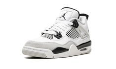 the air jordan iv is in white and black