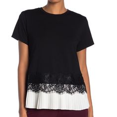 This Black And White T-Shirt Is Anything But A Basic Tee. With Delicate Lace Trim, And Pleated Hem Add Movement And Detail To This Top. This Top Is A Crew Neck Style, Short Sleeve, Lace Trim And Pleated Hem. This Top Is Brand New, And All Tags Of Purchase Are Attached. Black Crew Neck Top With Lace Trim, Crew Neck Lace Top For Layering, Lace Crew Neck Top For Layering, Lace Top Crew Neck For Layering, Black Cotton Tops With Lace Trim, Cotton T-shirt With Lace Trim, Short Sleeve, Cotton T-shirt With Lace Trim And Short Sleeves, Short Sleeve Cotton T-shirt With Lace Trim, Cotton T-shirt With Lace Trim