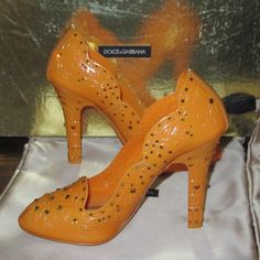 Original Owner, The Shoes Were Tried On Once Indoors For Just A Few Seconds. Orange Version Of The Pvc "Cinderella" Pumps Adorned With Rhinestones. Size Eur 36.5 Comes With Original Box And Dust Bags. The Box Was Damaged From Packing Tape, It Also Has Some Scratches And Dings. No Returns Or Exchanges. These Run Small. Orange Pumps, Shoes Dolce Gabbana, Dolce Gabbana Shoes, Packing Tape, Shoes Women Heels, Cinderella, Original Box, Dolce And Gabbana, Shoes Heels