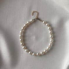 Material: High quality beads and metal hook ; Colors: White pearl beads ; Length: Adjustable, generally between 20-25 cm (adjustable upon request) Weight: Provides comfortable use with its lightweight design; Design: Simple and stylish, handmade design suitable for every combination; Usage: Easy to attach and remove with its secure hook structure; Care Instructions: To preserve the color of the beads, avoid direct contact with water and chemicals. ; Keep it in a dry and closed place when not in Pearl Anklet, Metal Hooks, Anklet Jewelry, Design Simple, Handmade Design, Design Design, White Pearl, Pearl Beads, Pearl White