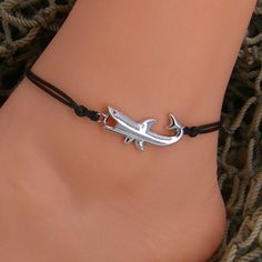 "Silver Alloy Metal Shark Adjustable Bracelet or Anklet. Silky Waxed Cotton Cord with Extension Chain Shark Charm is almost 1-1/4\" or 32mm Long Choice of Cord Color - Black or Blue Bracelet Adjusts from approximately 7\" 18cm up to 10\" 25cm Close up images are not actual size. Please read sizes in description to determine actual size In stock. Shipped daily from Florida USA Our jewelry items, parts, and shark's teeth are not toys and contain small parts, which are not suitable for small childr Merman Kirishima, Shark Charm, Hippie Bracelets, Seashell Necklace, Chain Extenders, Black Bracelets, Florida Usa, Shell Jewelry, String Bracelet