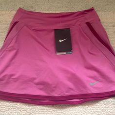 Athletic Skirt Brand New!!!! Perfect For The Gym, The Tennis Court, Or Anything!! Pink Athletic Skirt, Pink Sports Skirt With Lining, Pink Lined Sports Skirt, Fitted Nike Skirt, Nike Sports Skirt For Spring, Sporty Nike Skirt For Sports, Athletic Skirt Outfit, Grey Tennis Skirt, Gym Skirt