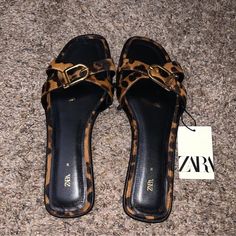 Zara Leopard Print Sandals. Color: Leopard. Size: 7.5. Purchased From Zara. Reasonable Offers Welcomed. Other Ways To Pay Accepted. Smoke Free & Pet Free Household. Chic Brown Flat Heel Sandals, Brown Flat Heels With Buckle Closure, Chic Brown Sandals With Flat Heel, Trendy Brown Slip-on Sandals, Brown Slip-on Heels For Vacation, Chic Open Heel Leopard Print Sandals, Chic Leopard Print Open Heel Sandals, Chic Brown Synthetic Sandals, Leopard Print Sandals With Buckle Closure