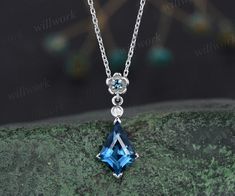 - Metal: Solid gold(14K/18K white/yellow/rose gold),925 sterling silver, platinum available- Main Stone: 7x10mm kite cut London blue topaz- Accent Stone: London blue topaz and diamond or moissanite- Chain: 16+2 inches. The chain can be adjustable to 18 Inches.- Can be personalized: Yes Blue Rose Cut Diamond Pendant Jewelry, Exquisite Blue Topaz Necklace Gift, Blue Rose Cut Diamond Necklaces For Weddings, Exquisite Blue Topaz Necklace For Gift, Blue Rose Cut Diamond Necklace For Weddings, Blue Rose Cut Diamond Wedding Necklace, Blue Topaz Necklace With Diamond Accents For Gift, Blue Topaz Necklace With Diamond Accents, Blue Topaz Necklaces With Diamond Accents For Gift