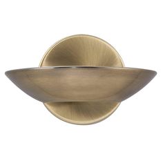 an antique brass finish wall light with a bowl shaped shade on the front and side