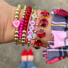 Make everyday Valentine's Day with this cute little clay heart stacker! Bracelet measures approx.7" in circumference. If you need a custom size, please leave your size in the Special Instructions box. Bracelets pictured in stack are (from L to R): Clay Heart, Color POP (Fuchsia), Color POP (Red), Sample (not for sale), Personalized Gold Bead, Mermaid Glass and The Sparkled Shell. Cute Heart Bracelet With Round Beads For Valentine's Day, Valentine's Day Multicolor Letter Beads Stretch Bracelet, Valentine's Day Playful Beaded Jewelry, Cute Heart Beads Beaded Bracelets For Valentine's Day, Cute Heart Beads Charm Bracelet For Valentine's Day, Cute Heart Beaded Bracelets For Valentine's Day, Cute Heart-shaped Beaded Bracelets For Valentine's Day, Cute Stretch Bracelet With Letter Beads For Valentine's Day, Cute Letter Beads Stretch Bracelet For Valentine's Day