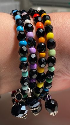 Cheap Multicolor Beaded Bracelets With Black Beads, Black Stretch Bracelet With Faceted Round Beads, Black Bracelets With Faceted Round Beads, Multicolor Spiritual Bracelets With Black Beads, Black Faceted Spiritual Beads, Black Stretch Bracelet With Faceted Beads For Gift, Black Stretch Bracelet With Faceted Beads As Gift, Handmade Black Friendship Bracelets With Round Beads, Black Beaded Spiritual Friendship Bracelets