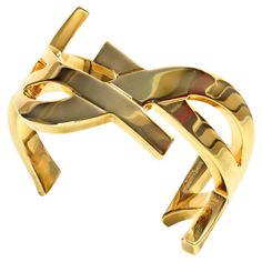 Collectible Saint Laurent YSL Gold Tone YSL Wrap Around Heavy Bracelet Cuff. Opening in back is 1.85" Rigid Cuff. I think this bracelet cuff speaks for itself with the YSL. Don't you? This should fit 7" to 8.5" Ysl Cuff Bracelet, Ysl Gold, Double Wrap Bracelet, November 23, Gold Bracelet Cuff, Saint Laurent Paris, Bracelet Cuff, Wrap Around, Hair Jewelry