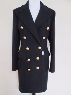 Balmain Coat 100% Authentic, purchased at Barney's Condition: New with Tags Size: French 42, US 10 The coat is the classic double breasted coat in black wool/cashmere blend. It has the iconic large gold tone buttons at the front. It has the iconic structured fit and shoulders and pockets at the front. Retail $4995. Coat measures approximately lying flat: bust-21", waist-18", sleeve length from shoulder seam to end-26", and length from the top of the shoulder to the hem-37" Comes from a smoke and pet free home Payment must be made within 3 days of auction end Please note, California buyers are required to pay CA sales tax Thank-You note: I do ship international, but the cost is not the same as US shipping, please contact for cost no returns accepted Balmain Coat, Double Breasted Coat, Gold Buttons, Double Breasted Suit Jacket, Black Wool, Wool Coat, Classic Black, Vest Jacket, Double Breasted