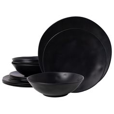 black dinnerware is stacked on top of each other