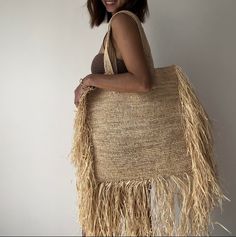 Natural raffia bag, from Madagascar, fringed beach bag Color: natural Luxury Fringe Tote Bag, Luxury Fringe Straw Bag For Beach, Luxury Fringe Straw Bag For The Beach, Luxury Shopping Bag With Fringe, Luxury Fringe Bags For The Beach, Luxury Fringe Shoulder Bag For Summer, Luxury Fringe Beach Bag, Luxury Natural Color Bags With Fringe, Raffia Fox