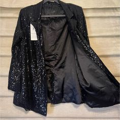 Wait For You Sequined Jacket Nwt Fully Lined Color Black Size Large, And A Medium Polyester Spandex With Tags Never Been Worn Excellent Condition Great For Taylor Swift Concerts Black Party Season Blazer, Black Long Sleeve Blazer For Party, Black Party Outerwear For Party Season, Black Sequined Outerwear For Party Season, Black Outerwear For Party Season Night Out, Black Long Sleeve Outerwear For Party Season, Black Sequined Outerwear For Fall, Black Sequined Long Sleeve Blazer, Black Sequin Long Sleeve Blazer