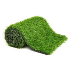 a roll of green grass on a white background