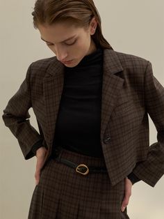 Editor's NotesThis is a one-button checkered tailored jacket set. Using buttons engraved with the Atelier Nain logo, it radiates a luxurious and modern vibe. The jacket has a decorative pocket on the chest, adding a clean yet standout detail when worn.- Cropped length that makes your look stylish- Lip pocket at the front chest as a refined touch- Deep color exuding the classic and clam mood* The color may appear differently depending on monitor resolutions and device settings.* Garments may get creased or wrinkled during shipping. Please steam iron or spray water a day before wearing.Measurements(in.)Size(S/M)- Shoulder: 17.01 in. / 17.52 in.- Chest: 20.0 in. / 20.98 in.- Hem: 18.0 in. / 19.02 in.- Armhole: 7.01 in. / 7.24 in.- Sleeve length: 22.99 in. / 23.74 in.- Total length: 16.26 in. Elegant Plaid Tweed Jacket With Button Closure, Elegant Plaid Blazer With Buttons, Elegant Houndstooth Blazer For Office, Elegant Plaid Blazer With Double Button Closure, Timeless Plaid Blazer For Work, Luxury Houndstooth Blazer For Office, Timeless Plaid Outerwear For Work, Luxury Plaid Tweed Jacket For Office, Luxury Plaid Tweed Office Jacket