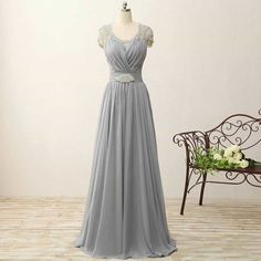 This cap sleeve evening gown is instock and ready to ship in our Plus Size 26. Gray Gown, Plus Size Evening Dress, Cap Sleeve Evening Gowns, Vowel Renewal, Formal Evening Wear, Formal Ball Gown, Mother Of The Bride Gown, Groom Dresses, Outfit Trends