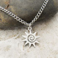 304 Stainless Steel Spiral Sun Charm Pendant, Men's Necklace, Hypo Allergenic Jewelry, Men's Jewelry, Woman Necklace, Celestial Stainless Steel Jewelry, Spiral Sun Charm  STAINLESS STEEL CHAINS - Are a more affordable alternative to sterling chains. They are durable, hypo allergenic and resist tarnishing.  STAINLESS STEEL CHAINS - Hypo Allergenic, Resist Tarnishing SMALL STAINLESS STEEL CHAINS Sm Flat Link Chain, 3 x 2 x 0.6mm, Stainless Steel Chain, Lobster Clasp Sm Twist Curb Chain, 3 x 2 x 0.6mm, Stainless Steel Chain, Lobster Clasp Sm Rolo Chain, 1.5 x 1mm, Stainless Steel Chain, Lobster Clasp Sm Box Chain, 2x2x1mm, Stainless Steel Chain, Lobster Clasp CORDED NECKLACES Waxen Cotton Cord: Strong alternative to leather but soft and smooth on the neck. Black or Brown color and includes a Spiral Sun, Woman Necklace, Spiral Necklace, Sun Charm, Steel Gifts, Brown Jewelry, Boho Chic Jewelry, Celestial Jewelry, Bone Beads