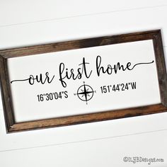 Our first home in a script font with a compass under the script and latitude and longitude coordinates on each side of the compass. Design is black on a white canvas and in a dark walnut stained wood frame. New Home Wood Sign Ideas, Home Coordinates Sign, House Warming Sign Ideas, House Warming Cricut Ideas, Our First Home Sign, Cricut Canvas Ideas, Reverse Canvas Sign Ideas, Diy Home Signs, First Home Sign