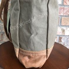 Oriver Winery Bag is constructed of repurposed sustainable military tent canvas. Strong and sturdy ready to go on your next shopping spree, run about town or a trip though wine country. Durable enough to make every day an adventure and classy enough to impress while doing it. Perfect size for the necessities and more. Superb gift for yourself or the wine enthusiast in your life, or those that just love a nice size bag that is versatile and looks great! Use as small travel bag, everyday purse, sh Grey Hair Celebrities, Best Beach Bag, Military Bag, Small Travel Bag, Tent Tarp, Military Mom, Everyday Purse, Canvas Purse, Size Matters