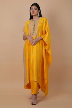 Yellow kaftan with floral zardozi embroidery. Comes with plain draped skirt. - Aza Fashions Silk Palazzo Set With Traditional Drape For Reception, Anarkali Gota Work Kaftan For Wedding, Bollywood Style Wedding Kaftan With Gota Work, Wedding Kaftan With Gota Work For Festivals, Wedding Kaftan With Gota Work For Festive Occasions, Wedding Kaftan With Dabka For Navratri, Festive Wedding Kaftan With Gota Work, Silk Palazzo Set With Zari Work And Traditional Drape, Festive Silk Kaftan With Gota Work