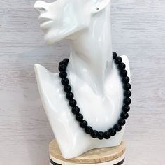 This classic unisex black necklace was hand beaded using 14mm round black glass beads - perfect for everyday wear! The necklace measures your choice of 18, 22, 26, or 30 inches in length and is securely fastened with a silver clasp. The end result is a versatile piece that goes with everything! Check out more fabulous jewelry and enter my shop here: https://www.etsy.com/shop/jewelbytessyla View the positive feedback I've received from customers and check out some beautiful art prints for nursery Classic Beaded Necklaces With Round Beads For Everyday, Classic Beaded Necklaces With Round Beads, Black Gemstone Bead Necklaces, Black Gemstone Beads Necklace, Black Beaded Necklaces With 8mm Round Beads, Classic Black Beaded Necklaces With Polished Beads, Black Beaded Necklaces With 8mm Beads, Black Beaded Necklaces With Large Beads, Classic Black Beaded Necklace With Polished Beads