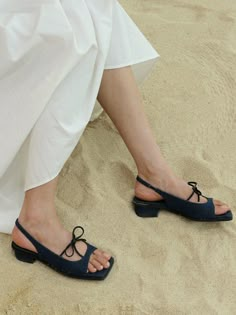 Editor's NotesComfy shoes that will keep you in style - Square toe sandals- Open toe- Accented with ribbon straps- Elastic slingbackMeasurements (in.)- Size: KR 220 (US 5) - KR 155 (US 8.5)- Heel: 1.2 in.- Fits true to the sizeComposition & Care-  Synthetic leather, fabric- Do not washDesigner- by halte allez Summer Slingback Pumps With Flat Heel And Medium Width, Summer Flat Heel Slingback Pumps In Medium Width, Summer Slingback Pumps With Flat Heel, Summer Slingback Pumps With Wrapped Heel, Summer Medium Width Slingback Pumps With Wrapped Heel, Summer Slingback Pumps With Wrapped Low Heel, Summer Open Toe Slingback Pumps With Wrapped Heel, Low Heel Lace-up Sandals For Beach, Medium Width Slingback Sandals For Beach