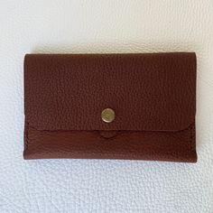 "| Handmade Leather snap wallet | Lightweight leather wallet small enough to fit into a pocket or small bag, but big enough for all of your essentials. this wallet is big enough to hold a passport. SIZE: 6\" x 4\" < 1 interior compartmet < 4 card slots (fits 2 cards per slot) < Outer pocket on the back  < Hand-Stiched < Lightweight and Compact >> Other colors available in separate listings.  Shipping is included in the price. If you live in MONTREAL and would like to pick the item up, write me f Small Backpack Purse, Leather Card Holder Wallet, Handmade Leather Backpack, Small Leather Wallet, Minimalist Leather Wallet, Leather Backpack Purse, Slots, Veg Tan Leather, Clip Wallet