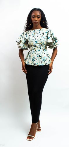 A cotton blouse. African Blouses Peplum Tops, African Blouses, Peplum Tops, Peplum Blouse, Cotton Blouse, Cotton Blouses, African Print, Ankara, Clothing Items