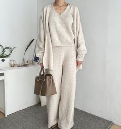 ▶ Colors ◀ Oatmeal Beige Charcoal ▶ Size ◀ One size(Free) - Please, check below size spec ▶ Fabric ◀ Wool / Poly / Acrylic / Nylon ▶Size Spec◀ Cardigan Total Length : 70cm Chest : 57cm (Around 114cm as circular) Shoulder : 58cm (Drop shoulder) Sleeve length : 44cm Pants Total Length : 100cm Waist : 32cm (Elastic banding-Around 64cm as circular) Hip : 49cm (Around 98cm as circular) Thigh : 28cm (Around 56cm as circular) Inleg : 73cm Front rise : 32cm Sleeveless knit top Total Length : 54cm Chest Strick Top, Loose Knit Cardigan, Sleeveless Knit Top, Cardigan Knit, Pants Loose, Sweater For Women, Loose Knit, Pantalon Large, Wide Pants