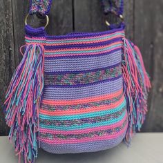 **Beautiful Handmade Woven Mochila Bag In Purple, Pink, And Aqua Hues** This Stunning Handmade Mochila Bag Is Expertly Crafted In Colombia By Skilled Artisans. Featuring A Vibrant Mix Of Purple, Pink, And Aqua Colors, This One-Of-A-Kind Bag Adds A Splash Of Color To Any Outfit. Versatile In Design, It Can Be Worn As A Crossbody Or Shoulder Bag. The Spacious Interior, Measuring 11.5 Inches In Height, 12.5 Inches In Length, And 9 Inches In Width, Is Perfect For Carrying All Your Essentials. This U Grey Crossbody Bag, Mochila Bag, Amanda Uprichard Dress, Beauty Inside, Aqua Color, Black Purses, Purse Bag, Women Supporting Women, Red Sweaters