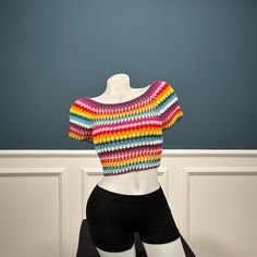 Crochet Crop Top is the perfect choice for summer days, when you want to feel comfortable and stylish. A trendy crochet is sure to be a hit with fashionistas everywhere. Make a statement with the retro-inspired crochet vest top, featuring a bright color combination. Please let us know if you would like specific bust, waist and hip measurements. Machine washable at low temperatures. Machine wash gentle (40 C/104 F) Trendy Vacation Tops With Crochet Trim, Trendy Crochet Lace Top For Summer, Multicolor Knit Top For Summer, Trendy Summer Crochet Top With Crochet Trim, Stretchy Multicolor Summer Tops, Multicolor Stretch Crochet Top For Spring, Trendy Fitted Tops With Crochet Trim, Trendy Crochet Top With Crochet Trim For Summer, Spring Multicolor Stretch Crochet Top