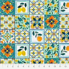 an orange and blue tile pattern with flowers on it