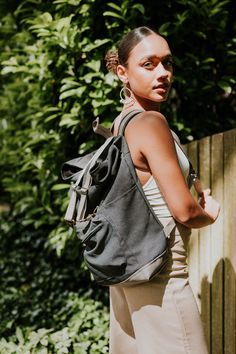 Going on an adventure? Are you off to class? Or on the go with a baby in tow? Travel about with style and comfort! Our new fold-over backpack features a fold-down flap, double claw hook closures, adjustable straps, and an outside zippered pocket. This new edition features a vegan leather bottom and taller side pockets for water bottles. Each backpack is made from quality upholstery material adding strength and durability. This trendy backpack is a must-have! When you make a purchase from Gift of Functional Adventure Backpack With Adjustable Strap, Casual Leather School Backpack With Adjustable Straps, Urban Bags With Adjustable Straps For Everyday, Travel Backpack With Removable Pouch And Flap, Casual Softback Backpack For Outdoor Activities, Casual Adventure Bag With Pockets, Canvas Backpack For Outdoor Activities With Pockets, Backpack Duffle Bag With Adjustable Strap For Outdoor Activities, Duffle Backpack With Adjustable Strap For Outdoor Activities