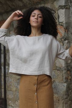 "SIZES Washed linen crop top with long sleeves. This top is perfect to wear with any skirt or pants. It fits very comfortably over the head and has no closures. It is made with high quality washed linen and handmade in Spain. DETAILS Oeko-Tex certified quality guarantee. 100% European linen ( Belarusian )of the best quality of a medium weight (185gr) This linen is washed and softened to have a nice touch. Linen is an ecological and breathable fabric as it is a 100% natural fabric. All our garmen Simple Long Sleeve Tops For Everyday, Simple Long Sleeve Relaxed Fit Top, Effortless Long Sleeve Fitted Tops, Cropped Linen Top For Fall, Linen Crew Neck Blouse For Fall, Simple Long Sleeve Summer Tops, Versatile Cropped Linen Tops, Casual Cropped Linen Top, Everyday Long Sleeve Linen Tops