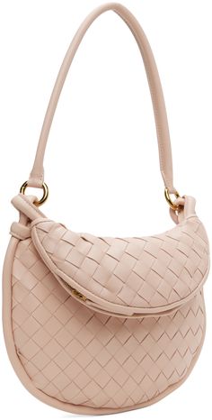 Intrecciato-woven grained lambskin shoulder bag in pink. · Detachable rolled shoulder strap · Zip pocket at face · Knotted accent at sides · Zip closure · Grained calfskin lining · H6.75 x W10.25 Supplier color: Lotus/Brass Pink Woven Leather Tote Shoulder Bag, Luxury Pink Shoulder Bag With Intrecciato Weave, Chic Pink Woven Leather Shoulder Bag, Pink Woven Leather Bag, Chic Pink Woven Leather Bags, Black And Brass, Small Shoulder Bag, Bottega Veneta, Calf Skin