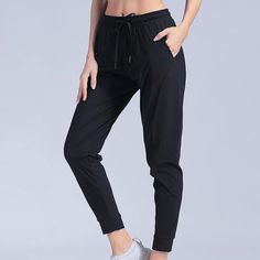 Style: Casual Age: 18-24 Waist Type: high Decoration: Pockets Elasticity: Medium Strecth Fabric Type: Broadcloth Pattern Type: Solid Pant Style: pencil pants Material: nylon Fit Type: regular Length: Ankle-Length Pants Season: Spring/Summer Closure Type: Elastic Waist Gender: WOMEN Front Style: Flat season: spring summer people: female girl women lady occasion: indoor outdoor home Ankle-length Yoga Pants With Pockets For Workout, Stretch Gym Bottoms With Pockets, Sportswear Yoga Pants With Pockets, High Stretch Gym Pants With Pockets, Solid High-stretch Bottoms With Pockets, High Stretch Solid Color Bottoms With Pockets, Stretch Sportswear Pants With Pockets, High Stretch Solid Bottoms With Pockets, Ankle-length Workout Joggers With Pockets