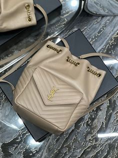 Size: 22cm*29cm*15cm It comes with Dust box, Care manual, Tag, and Paper bag. High-end Bucket Shopping Bags, High-end Daily Backpack, Designer Large Capacity Pouch Bucket Bag, Designer Backpack Shoulder Bag For Shopping, High-end Everyday Pouch Bag, High-end Bucket Satchel, High-end Bucket Satchel For Travel, Designer Beige Bag For Errands, High-end Travel Bucket Satchel