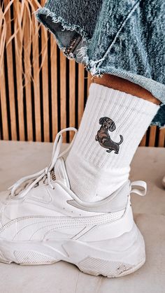 High quality embroidered socks! Composition: 85% combed cotton, 10% polyamide fiber, 5% elastane. These socks are made from combed cotton for a comfortable and non-shrinking fit.  Show your love for Dachshunds with these adorable white socks featuring a beautifully embroidered Dachshund dog! Available in sizes for both women and men, these cozy and stylish socks add a playful touch to any outfit. Whether you're lounging at home or out and about, these socks provide a soft, snug fit that keeps yo Funny Socks Outfit, Embroidered Dachshund, Dachshund Design, Tennis Socks, Embroidered Socks, Unique Socks, Sock Outfits, Stylish Socks, Socks Gift