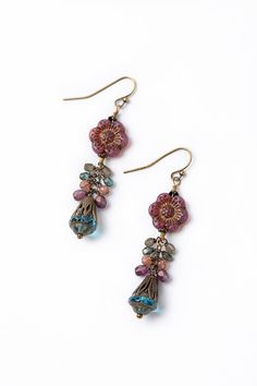 From the Mauve collection these earrings are longer in design and handcrafted with a fun Czech glass flower focal. Antique Brass (nickel and lead-safe) Czech Glass 2.5", with antique brass ear wires We hand select our natural materials, thus there may be slight variations in color and/or size that will not detract from the overall aesthetic Our unique handcrafted designer jewelry for women is made in America, each design created individually in our personal design studio in Floyd VA USA Handmade Bohemian Flower Earrings With Czech Glass, Handmade Czech Glass Flower Dangle Earrings, Bohemian Czech Glass Dangle Flower Earrings, Bohemian Glass Beaded Earrings With Ear Wire, Nickel-free Czech Glass Flower Earrings, Bohemian Beaded Earrings With Glass Ear Wire, Handmade Czech Glass Flower Earrings In Vintage Style, Bohemian Brass Flower Earrings, Bohemian Glass Drop Earrings