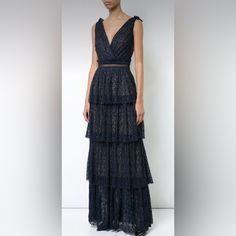 - Excellent Pre-Owned Condition - Length: 50.5in - Waist: 25in V Neckline, Sleeveless, Back Zip Closure, Tiered Maxi Long Skirt, Crochet Panel Under Bust, Shimmery Metallic Threading. Navy, Dark Blue. Cocktail, Party, Event, Night Out, Semi Formal, Wedding Guest, Date, Evening, Gala, Black Tie. Blue Lace Gala Dress, Blue Lace Evening Dress For Cocktail, Blue Lace Cocktail Evening Dress, Blue Lace Floor-length Maxi Dress, Tiered Gown, Crochet Panel, Skirt Crochet, Evening Gala, Semi Formal Wedding