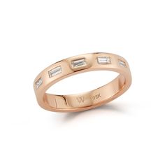 a rose gold wedding band with baguettes