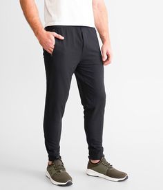 SAXX Trailzer Performance Jogger - Black Medium, Men's Black Solid knit jogger Inseam measures 29 Elasticized cinch tie waistband Front zipper pockets Back welt pocket Faux fly Moisture wicking Odor resistant Flat Out Seams have reverse stitching for an itch free experience. 89% Recycled Polyester 11% Elastane. Machine wash cold gentle cycle. Only non-chlorine bleach when needed. Tumble dry low. Iron low.. MEN'S ACTIVE SIZE CONVERSION CHART Size XS S M L XL XXL Waist 26-28 28-30 31-33 34-36 38-4