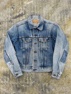 1970s Levi's Type 3 Big E Denim Trucker Jacket - Size 40 (tagged) (check measurements) Measurements (inch/cm) - Pit to pit: 19.5 inch / 49.5 cm - Length: 22.5 inch / 57 cm - Sleeve: 23.5 inch / 59.5 cm - Blue colour. Hole on neck and sleeves, please check pictures for further inspection! '350' serial number on buttons. Big E as seen on red Levi's tab. 1970s era design and tags. - All items are second hand and vintage so please expect signs of wear! - No refunds or returns! - DM with any further Vintage Denim Jacket With Relaxed Fit And Pockets, Vintage Selvedge Denim Jacket For Fall, Retro Faded Denim Jacket With Pockets, Vintage Denim Jacket With Patch Pockets For Fall, Vintage Fitted Denim Jacket With Patch Pockets, Vintage Fitted Selvedge Denim Jacket, Vintage Selvedge Denim Jacket, Fitted Vintage Faded Denim Jacket, Levis Trucker Jacket Men