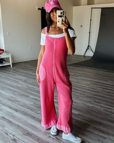 Meet your new wardrobe MVP: the pink jumpsuit! 🌸 Perfect for everything from brunch with the girls to date night, this jumpsuit is all about effortless chic. With its flattering fit and playful vibe, it’s the go-to piece that’s as comfy as it is stylish. Pair it with your fave heels or cute sneakers for a look that’s always on point. Comfortable Summer Loungewear Jumpsuits And Rompers, Comfortable Summer Loungewear Jumpsuits, Comfortable Summer Jumpsuits And Rompers For Loungewear, Trendy Cotton Beach Overalls, Trendy Cotton Overalls For The Beach, Casual Wide Leg Jumpsuits And Rompers For Loungewear, Casual Wide-leg Jumpsuit For Loungewear, Comfortable Summer Beach Jumpsuits And Rompers, Comfortable Summer Jumpsuits And Rompers For Leisure