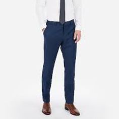 This Slim Navy Suit Pant Is Made From A Breakthrough Stretch Fabric That Moves With You And Keeps Its Shape. They're A Game-Changing Choice For Short Commutes, Cross-Country Flights And Everywhere In-Between. Lightweight Seasonless Fabric Slim Fit, Sits Below Waist, Straight Narrow Leg Button Closure With Zip Fly Dry Clean; Imported Deep Slant Hand Pockets, Buttoned Back Pockets Matching Jacket Style #6071560 Virgin Wool/Polyester/Elastane Suit Pant, Navy Suit, Slim Pants, Blue Wool, Cross Country, Jacket Style, Stretch Fabric, Wool Blend, Dry Clean