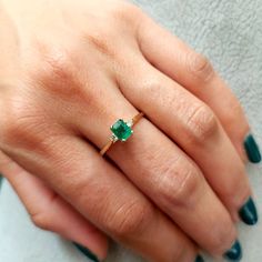 Gold Ring set with Diamonds and Emerald , engagement ring, Gold ring, Natural stone, Birthstone ring, Gemstone ring, Solid 14k, Promise ring. This handmade Gold ring with Diamonds and Emerald is made of 14K genuine gold and set with one Natural stone. This Stunning Ring is High end finish. This 14k Gold ring with green stone can serve as an Birthstone ring or a birthday gift. Stone size is 4/5 mm octagon cut Emeralds are known to heal both emotional love and the physical heart. It is a powerful Diamond Baguette Cut Gemstone Rings, Elegant Gemstone Rings With Baguette Cut, Fine Jewelry Emerald Ring With Princess Cut, White Gold Emerald Promise Ring Fine Jewelry, Elegant Baguette Cut Gemstone Rings, Promise Ring With Princess Cut Brilliant Emerald, Promise Ring Emerald With Brilliant Princess Cut, Princess Cut Brilliant Emerald Ring For Promise, Princess Cut Emerald Ring With Center Stone