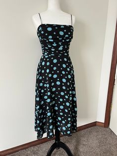 Adorable vintage blue polka dot dress Size 8 (please see measurements below! I'd say this fits more like a modern 4) Laying Flat: Pit to Pit: 14" Waist: 16" Pit to Hem: 38" Fantastic condition ** Please Read  Standard International shipping does not include tracking outside of Canada. Please review your shipping options for tracking and faster delivery! Unfortunately I do not offer returns on purchases made on Late to the Party Vintage. All sales are final. All items are previously loved and som Summer Polka Dot Dresses With Fitted Bodice, Spring Polka Dot Fitted Midi Dress, Casual Fitted Polka Dot Midi Dress, Fitted Sleeveless Polka Dot Midi Dress, Summer Polka Dot Fitted Midi Dress, Fitted Polka Dot Midi Dress For Summer, Summer Fitted Polka Dot Midi Dress, Fitted Polka Dot Lined Dresses, Polka Dot A-line Lined Dress