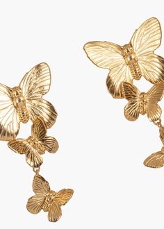 Embrace the natural beauty of butterflies with the Avah Earrings. Each earring features three golden butterflies that gently cascade from the ear, creating eye-catching movement and framing the face. Each butterfly is hand crafted with lifelike detailing. Try our classic Alessandra Earrings for an even bolder look. Luxury Hair Accessories, Fashion Shoots, Jennifer Behr, Luxury Hair, Blue Bridesmaids, The Ear, Fine Jewelry Gift, Fashion Shoot, Art History